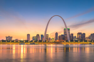 St. Louis, Missouri, USA downtown cityscape on the river at dusk.