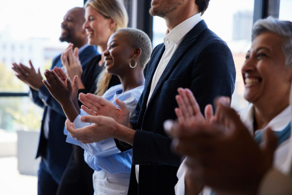 office staff applause