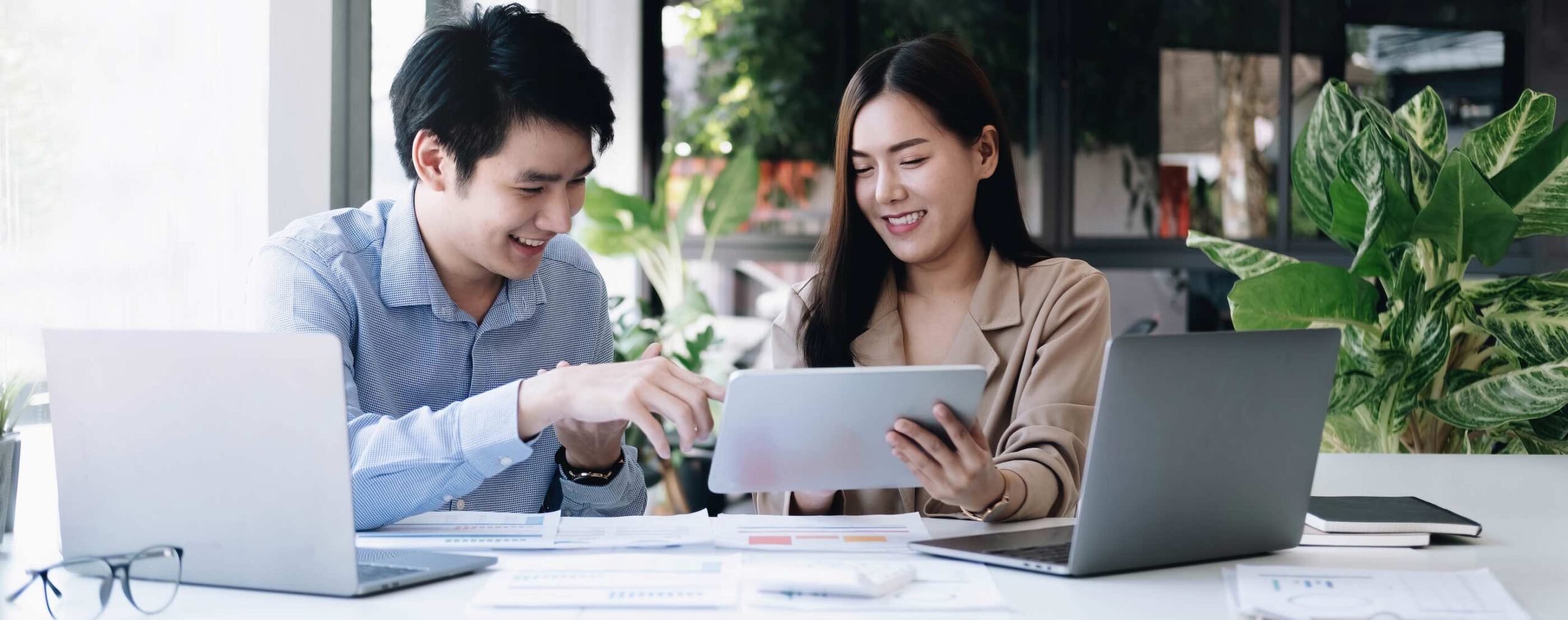Two professionals discussing tax preparation